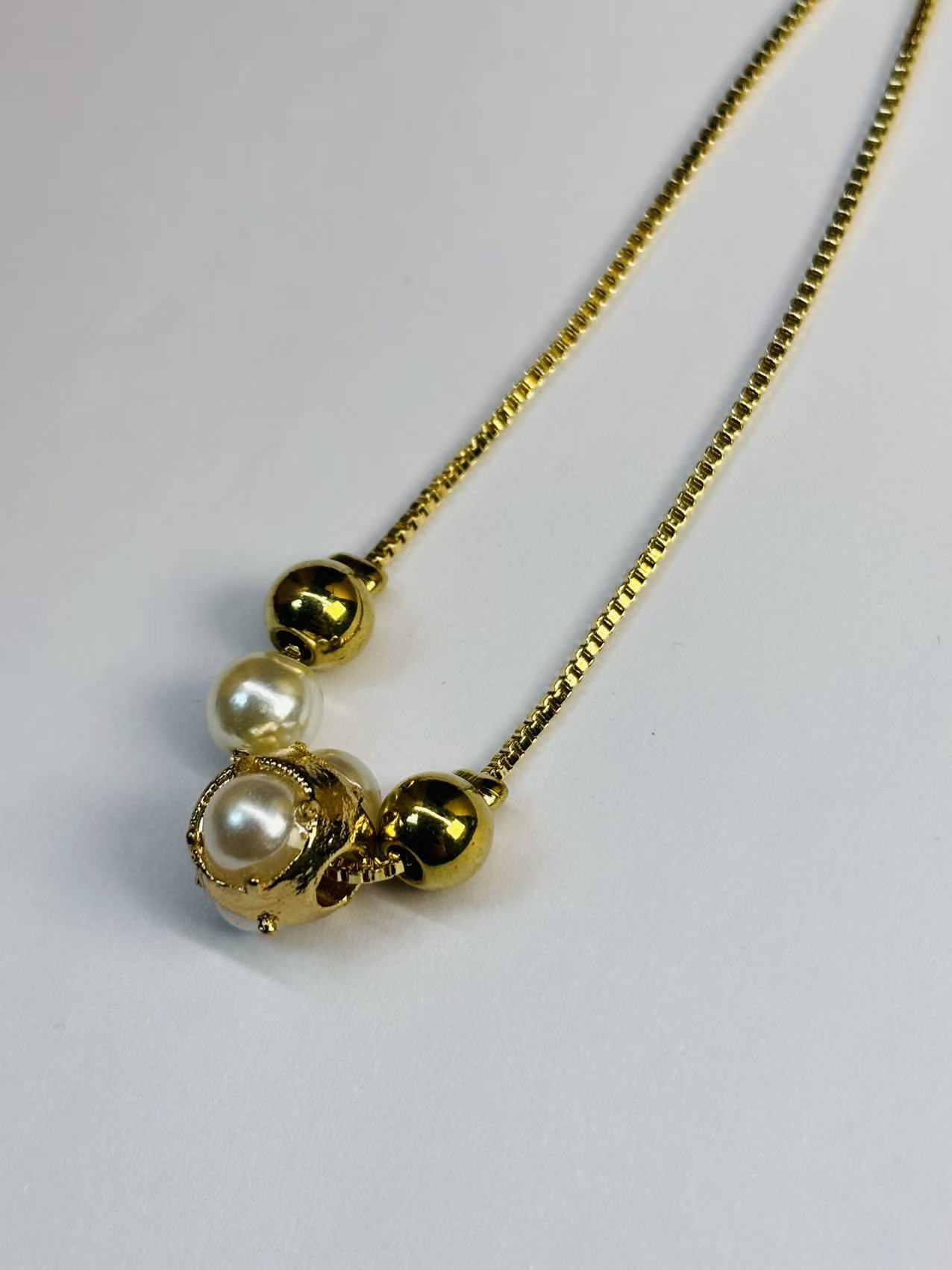 微信图片_20251112200340_184_64 Golden Chain Pearl Skull Pendant Necklace - Image 1